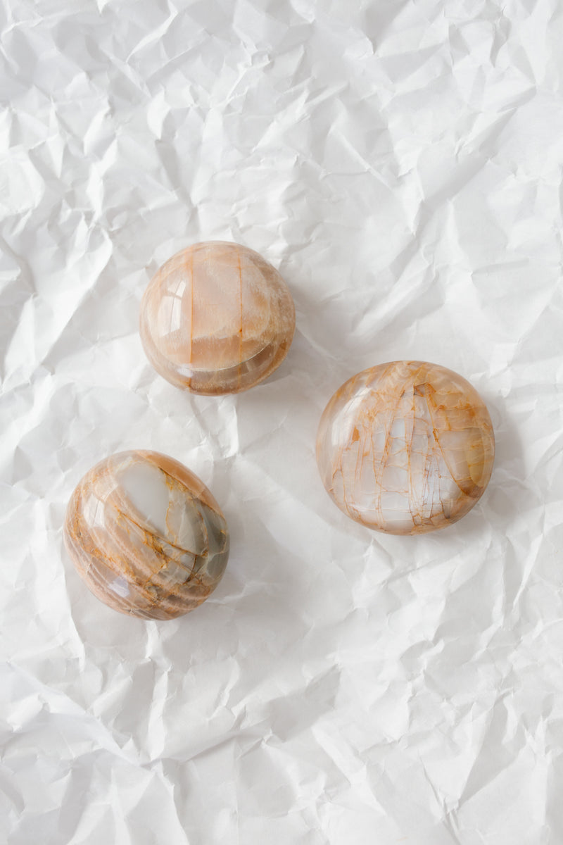 Peach Moonstone Palm Stone - Apothecary Co.